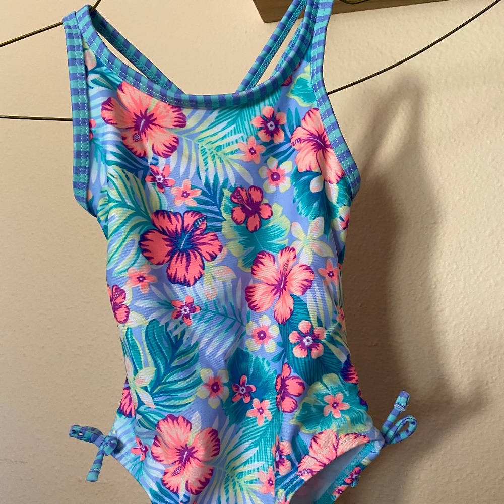 4 swimsuit worn once and she outgrew it!